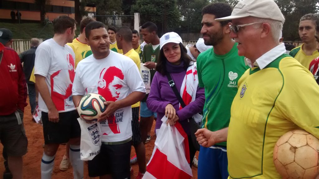 Andre, Getulio and Vinnie with the mayor at the end of the match, Vila Prudente, Brazil