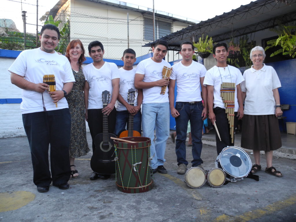 Sr Mark with music band, La Chacra, El Salvador, CAFOD