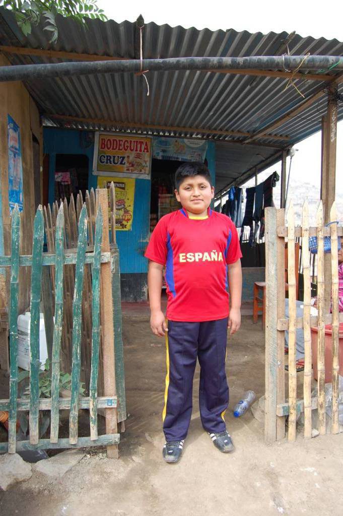 Elvis outside the shop - Peru, CAFOD