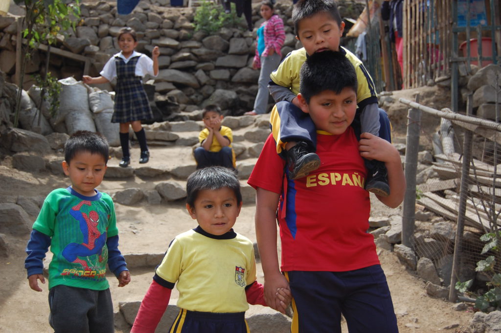 Elvis takes his brothers and sister to school - Peru, CAFOD