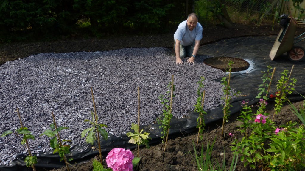 Joe Falzon working in the livesimply garden