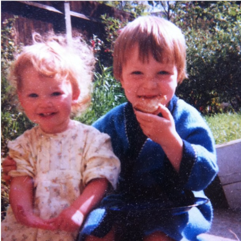 Ellie Wilcock as a child with her brother