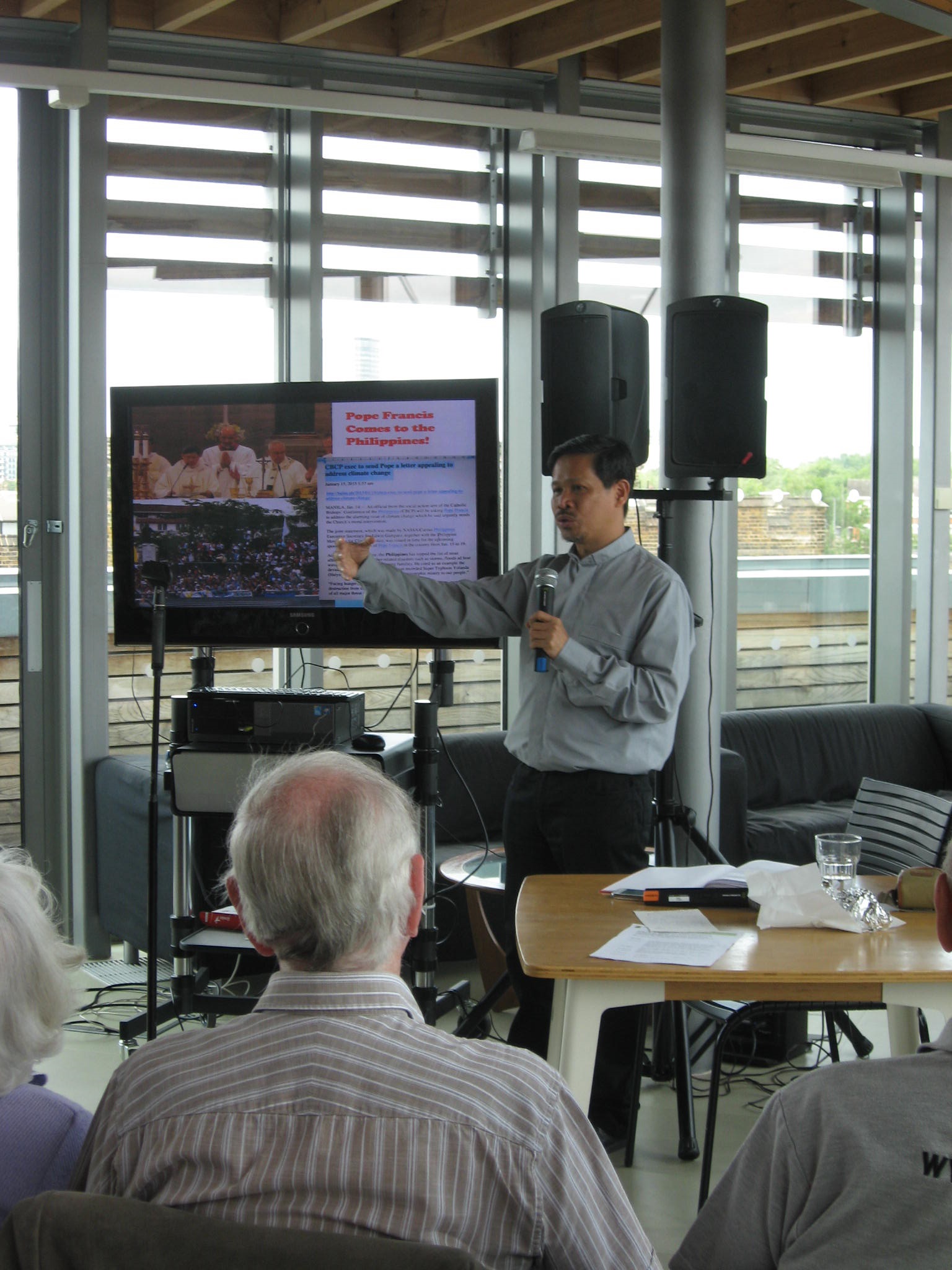 Fr Edu talks to CAFOD supporters at Romero House