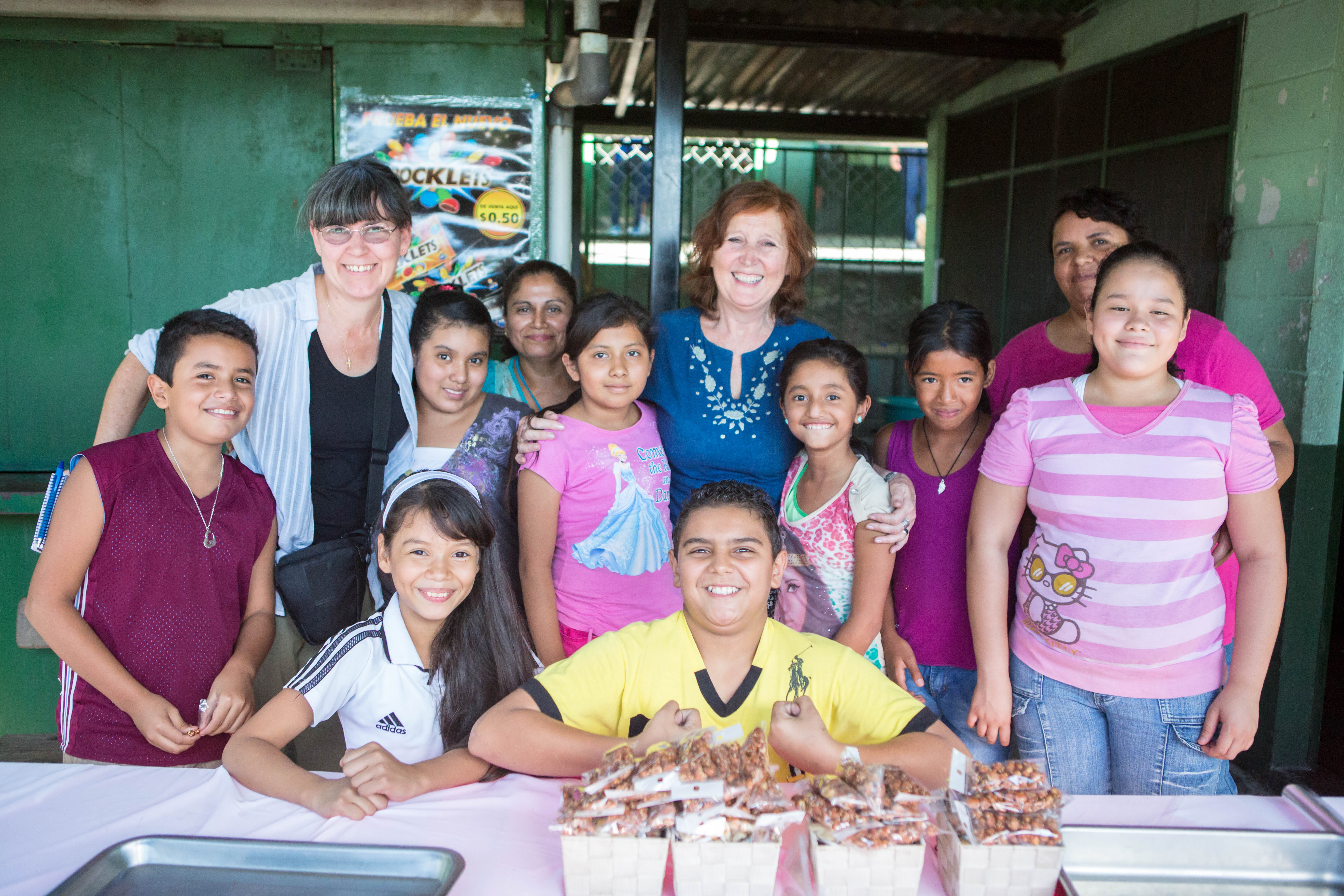 Kathleen (back row, far left) in El Salvador.