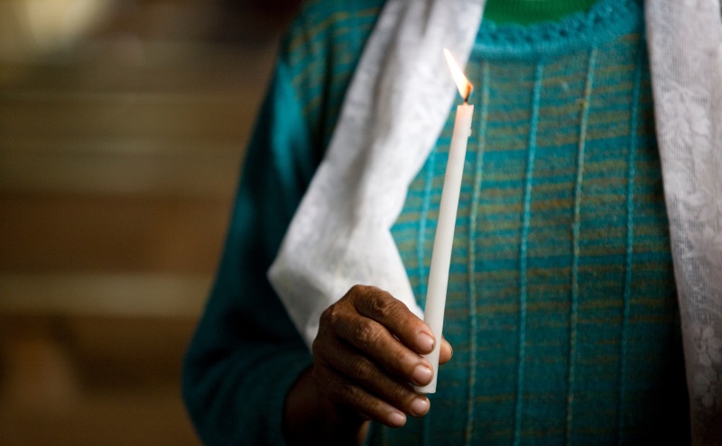 Lady holding a candle