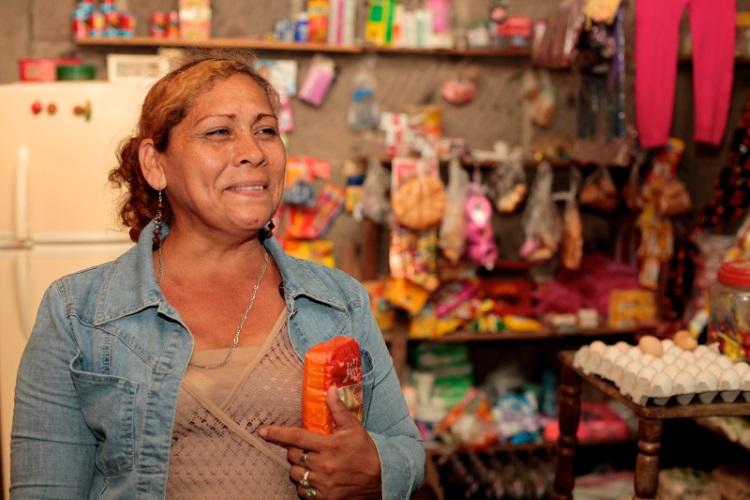 With CAFOD's help Justina has set up a small business and an adult literacy class to help her neighbours