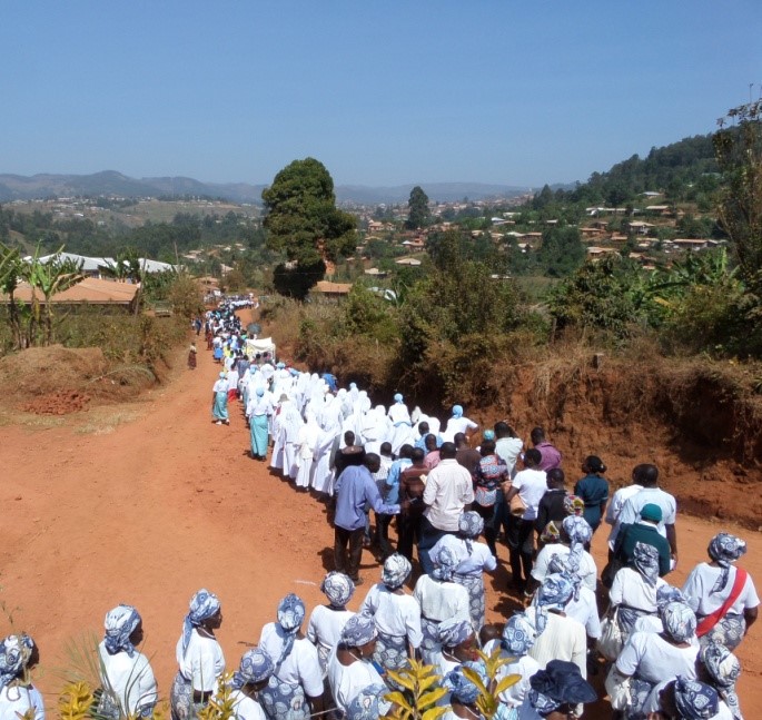 Christ, King of the Universe parish procession (much singing and dancing)