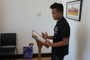 A CAFOD young leader practices speaking at Mass