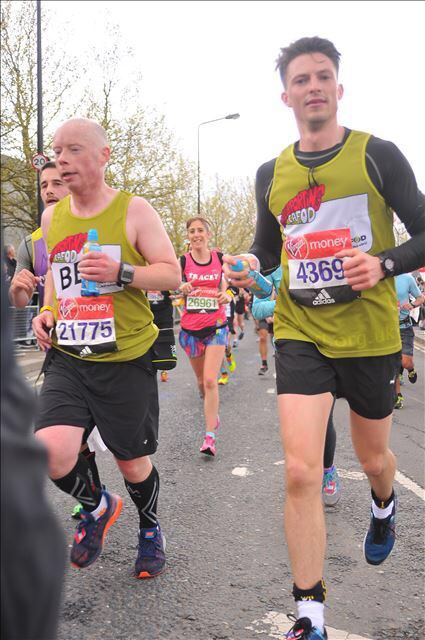 Ben (left) running with fellow volunteer Alistair Thornton, in the 2016 London Marathon