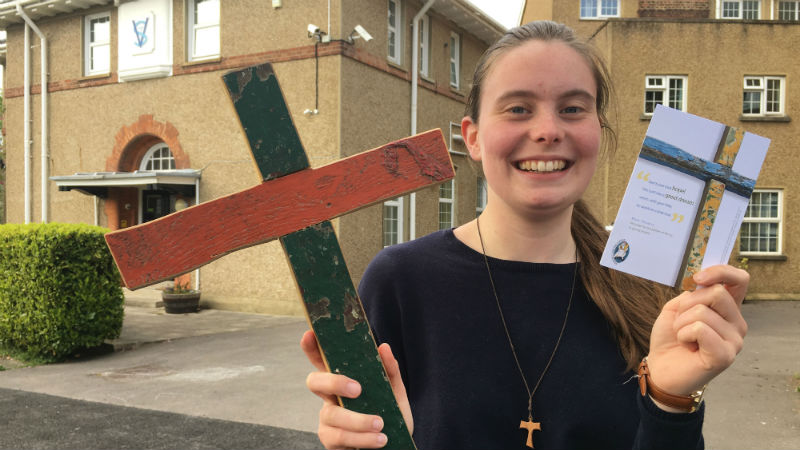 Bethan with a Lampedusa cross and action card at St. Vincent’s, Whitstable