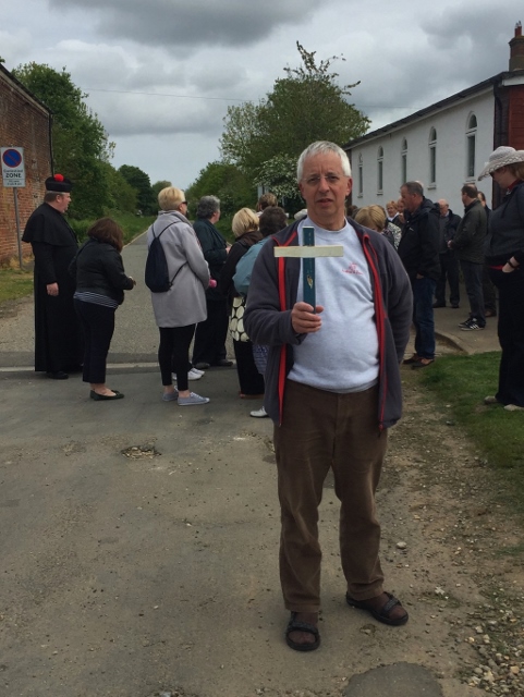 Kris holding the Lampedusa cross in Walsingham