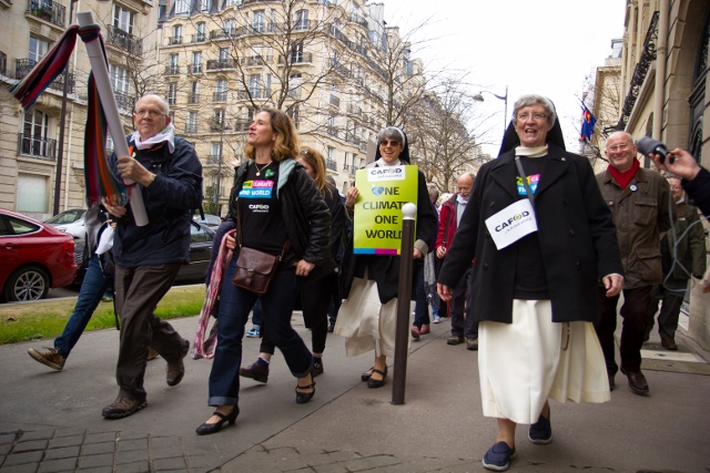 CAFOD campaigners took to the streets of Paris in response to Laudato Si' 