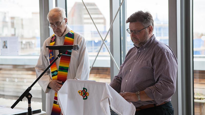 CAFOD Director Chris Bain reads during the Mass for Volunteers