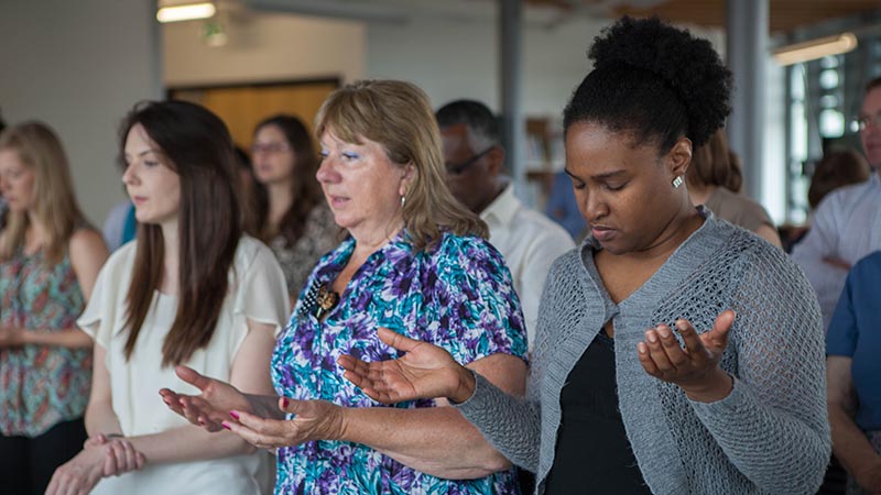 CAFOD Volunteers and staff pray at Mass during Volunteers' Week.