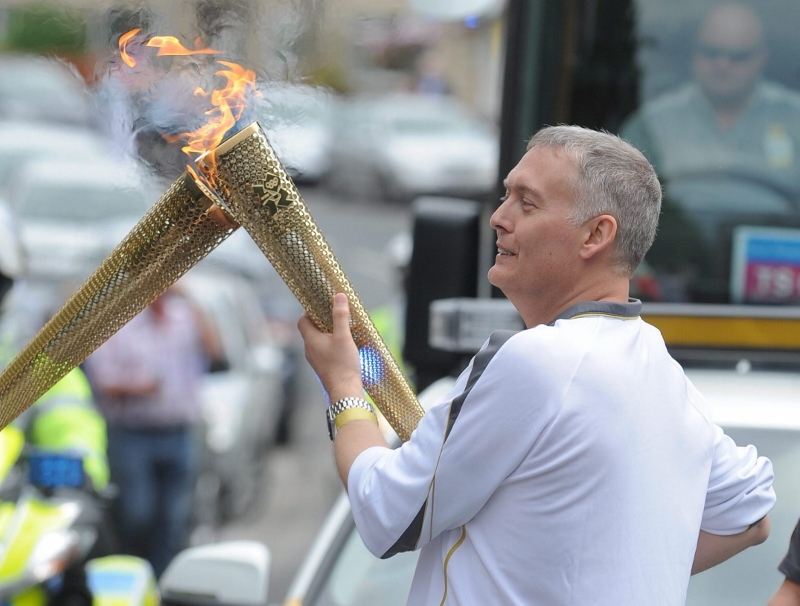 John McBride carrying the Olympic flame trough Barnard Castle