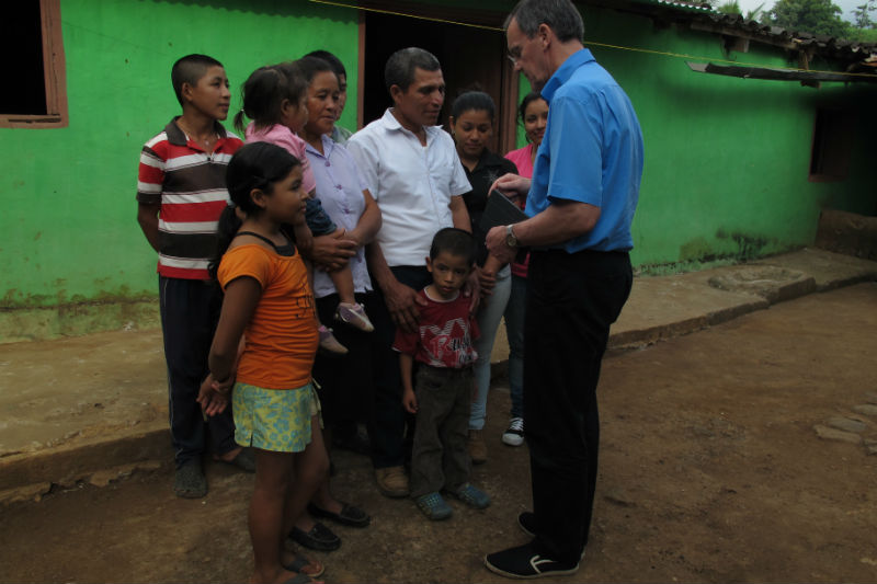 bishop-john-arnold-with-fidel-julia-and-their-family2