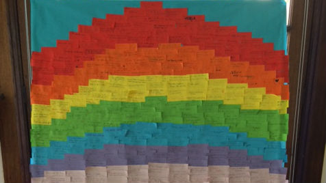 During the Harvest assembly, the school community created a bright rainbow showing their hopes for the world.