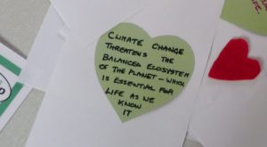 Climate change messages for MPs on green hearts, CAFOD