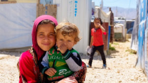 Syrian refugee children living in an informal camp in Lebanon