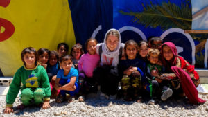 Yadviga, centre, with Syrian refugee children in Lebanon