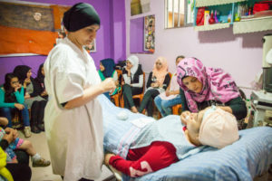 Refugee women learning about beauty treatments in Lebanon