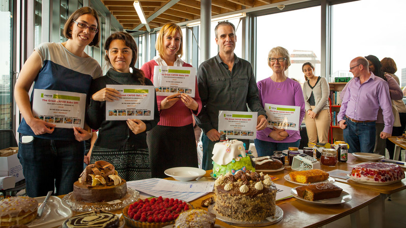 Staff members at the Romero House annual bake off competition