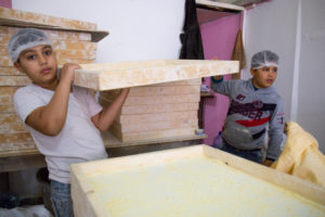 The brothers working at the bakery.