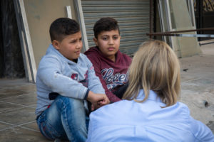 Yazan and Majed talking to Julie.