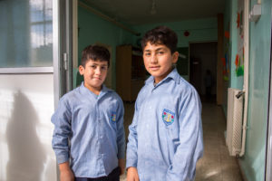 Mostafa and Hussein all dressed up for school.