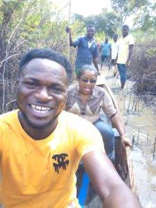 Oge Chukwudozie, CAFOD’s Humanitarian Capacity Strengthening Officer (second in the photo) travelling by canoe during the recent floods in Kogi state. 