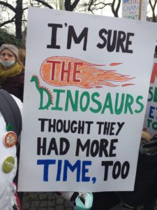 Placard from COP24 "I'm sure the dinosaurs thought they had more time too"