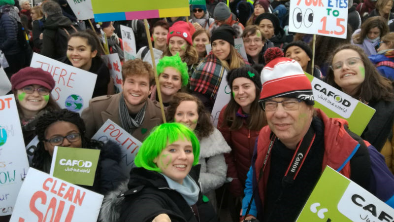 CAFOD campaigners marching at COP24 in Poland