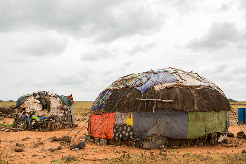 The homesteads in Kenya, made from wood, t-shirtsm tarpaulin and other random bits of material.