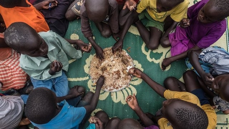 Children eating bread