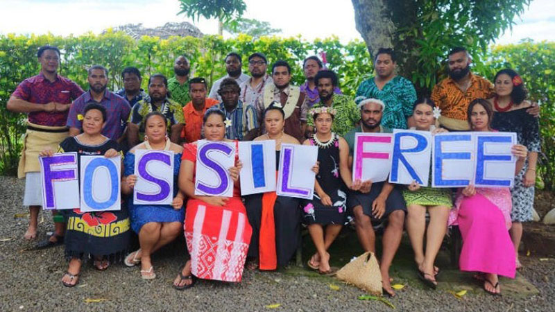 Auimatagi - in the centre with glasses - and the Pacific Climate Warriors are sending their message for the Fossil Free Campaign.