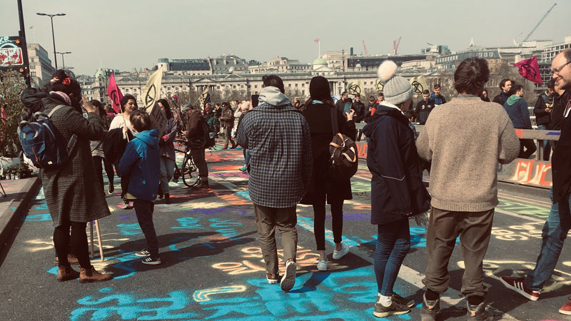 Climate change protesters on a bridge in London