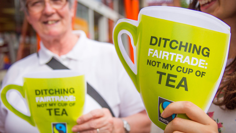 CAFOD campaigners protesting against Sainsbury's decision to drop Fairtrade from certain of its own-brand teas.