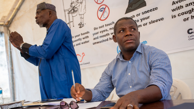 Kayode Akintola (right) during a COVID-19 awareness training for religious leaders at CAFOD's office in Freetown