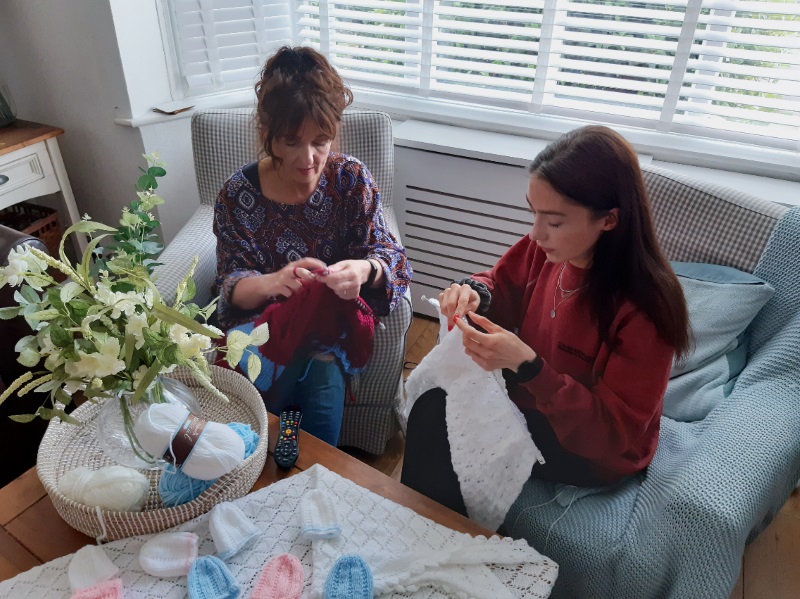 Ellen knitting with her mum