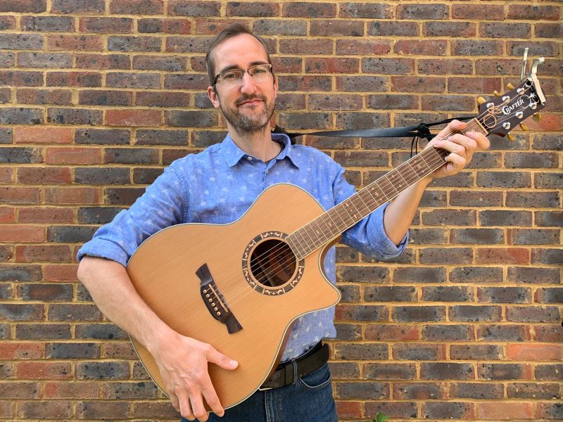 Martin with his guitar