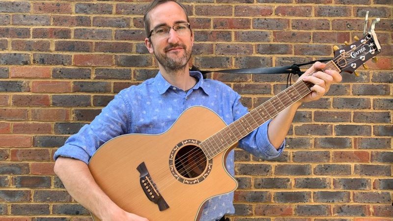 Martin with his guitar