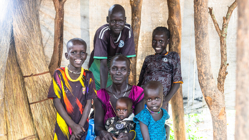 Nyanguet is surrounded by her five children