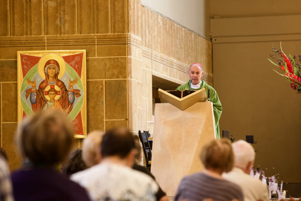 Bishop Paul Mason gives the homily at the Your Catholic Legacy Mass 