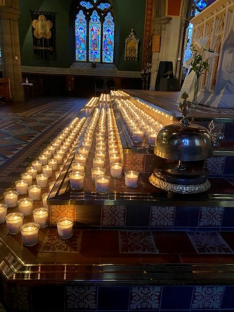 Candles across the sanctuary step